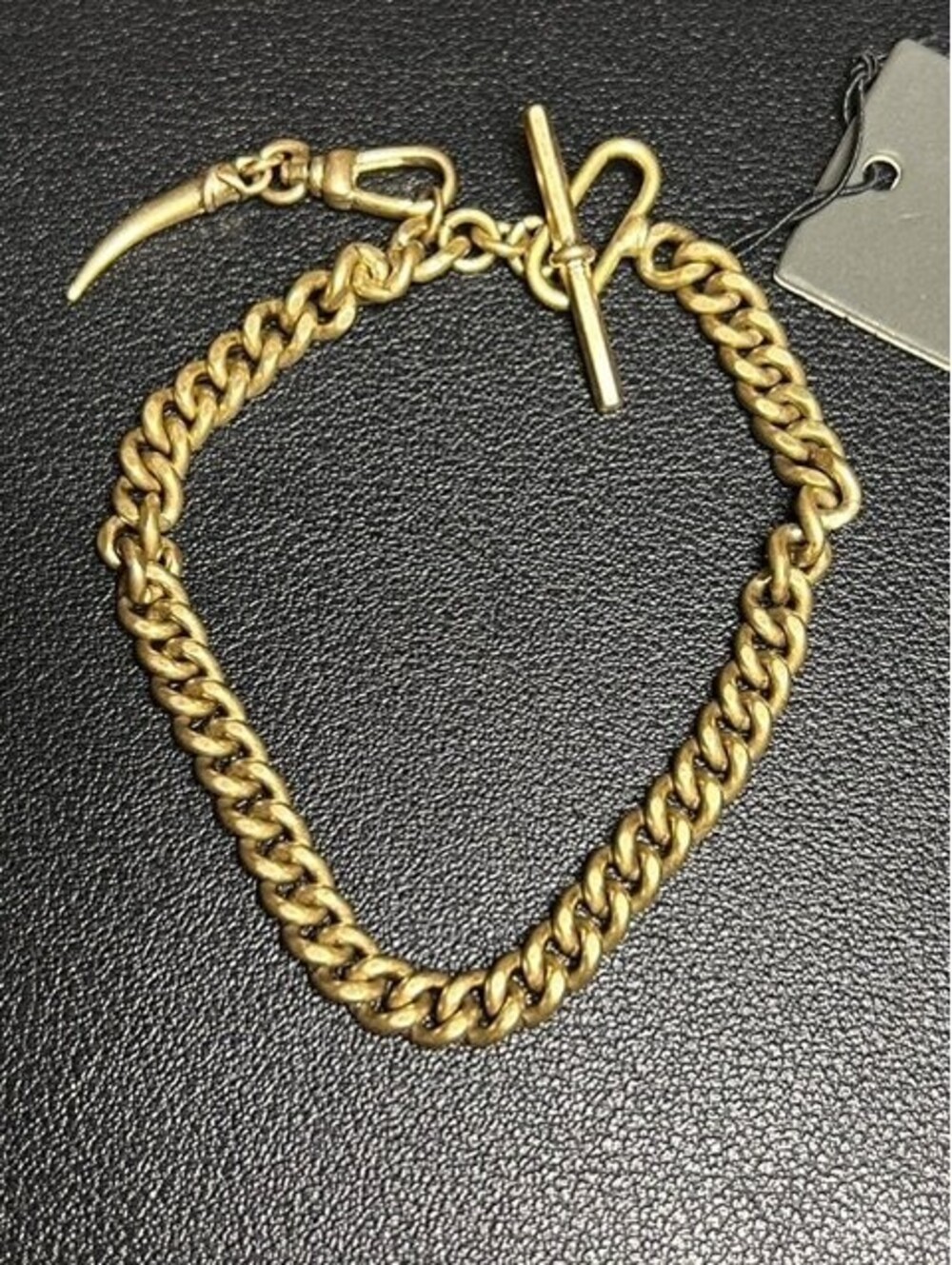 B7002 ALLSAINTS Curb Chain Bracelet Toggle Clasp Horn Pendant Gold Tone 7.5"